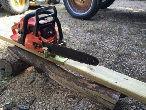 chainsaw with Lumbermaker and guide