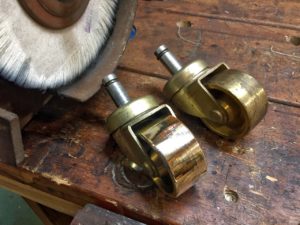 photo of the new casters before and after buffing