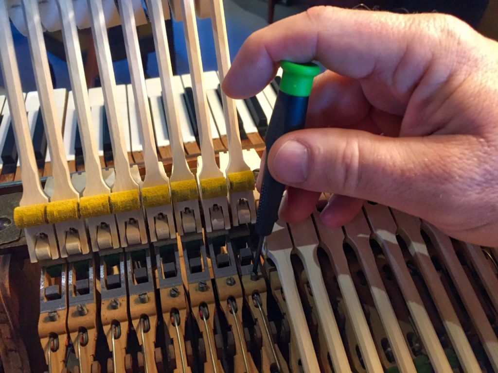 photo showing how to adjust repetition level spring tension