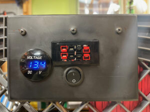 photo of the 12-volt panel with volt meter and Anderson connectors