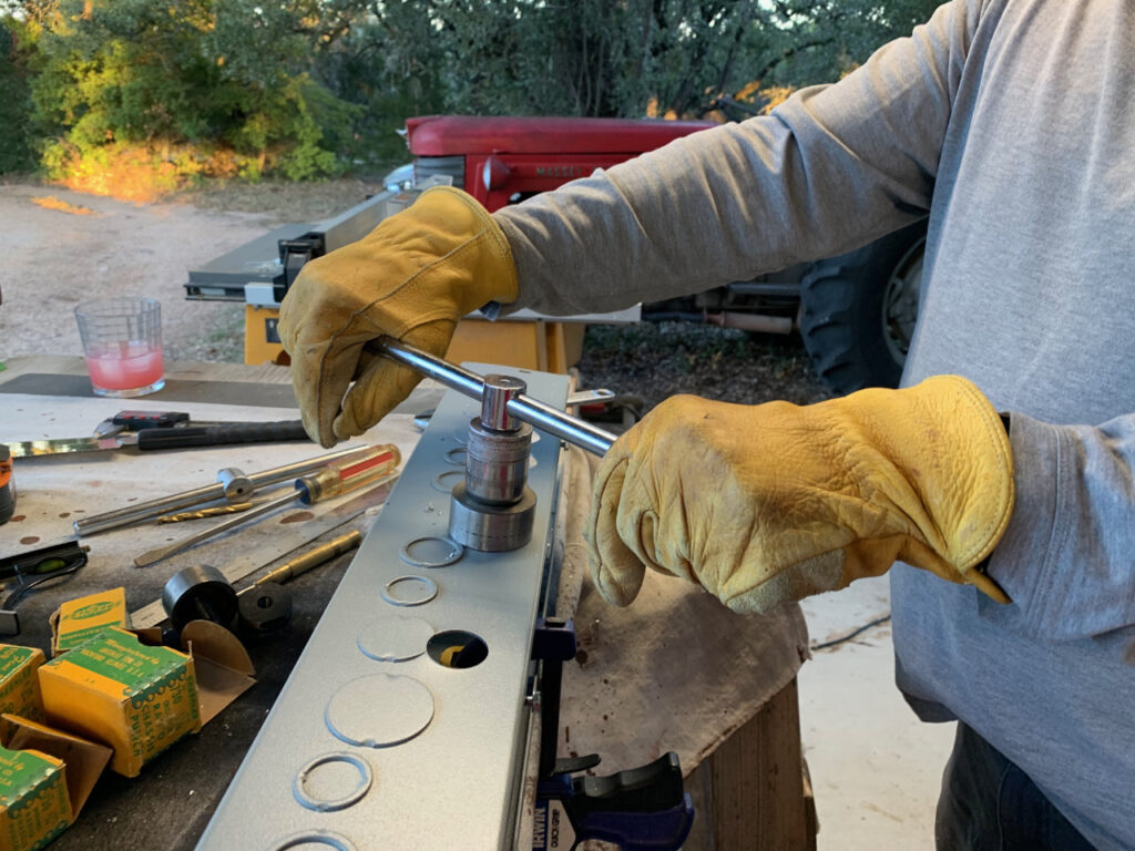 photo of Preparing the conduit with Greenlee Metal Punches