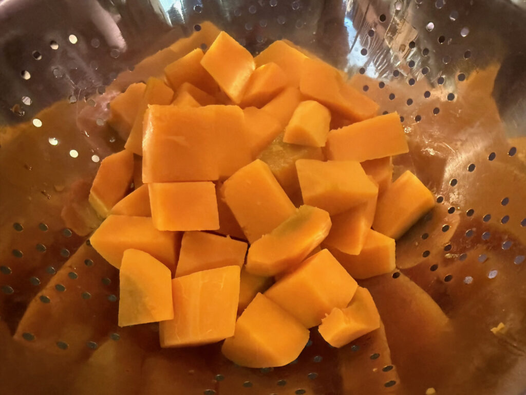 photo of Butternut Squash, cubed in a colander 