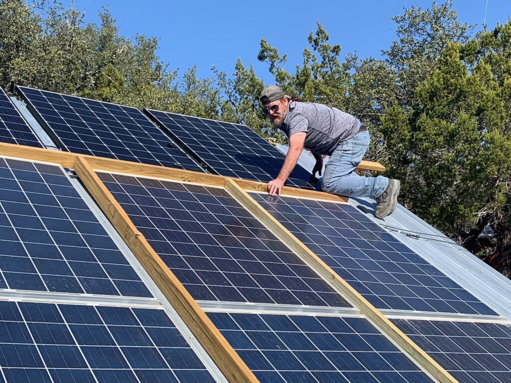 jason puts the last panel on