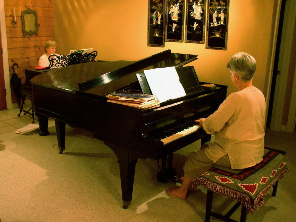Weber and Baldwin pianos in performance